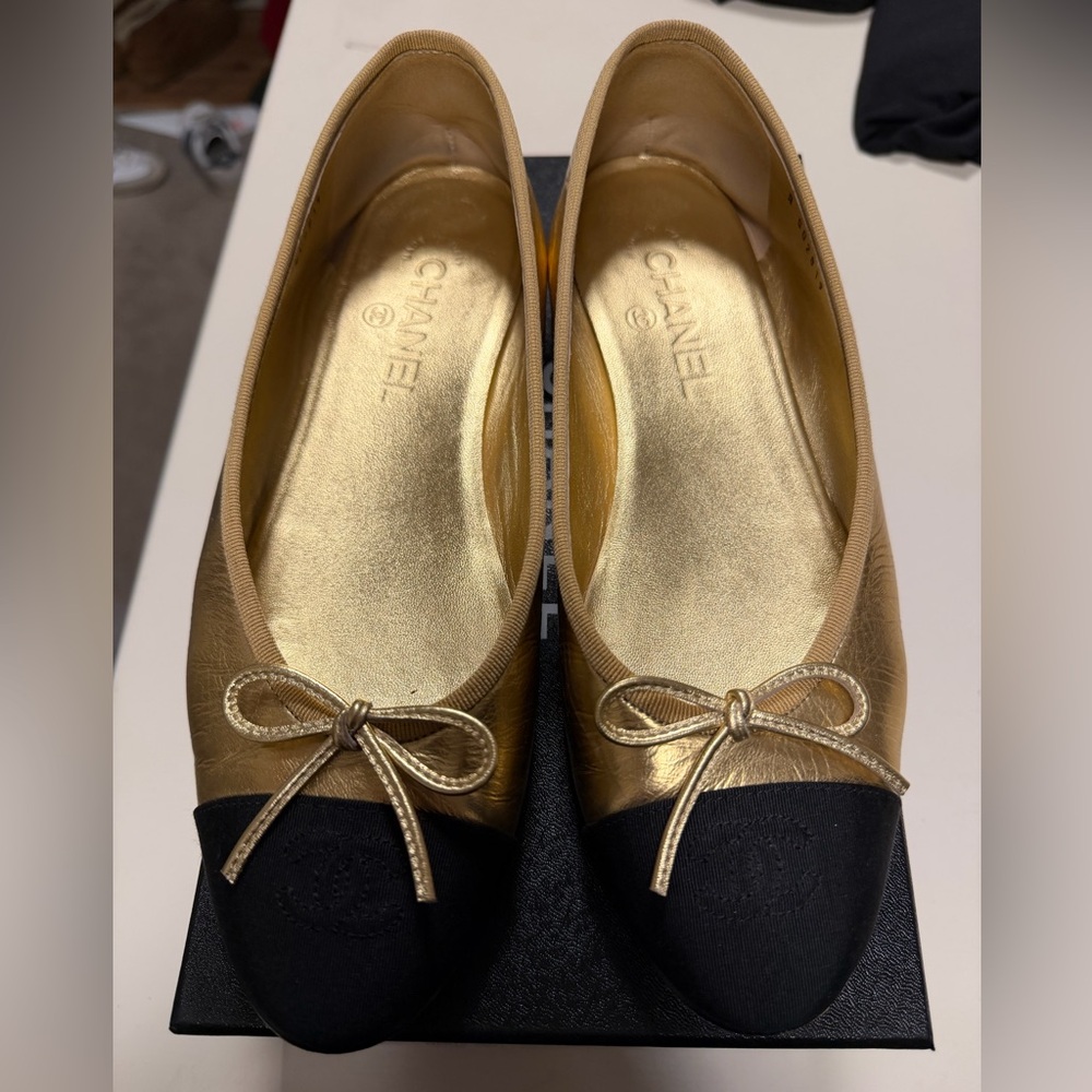 CHANEL Metallic Gold and Black Ballet Flats